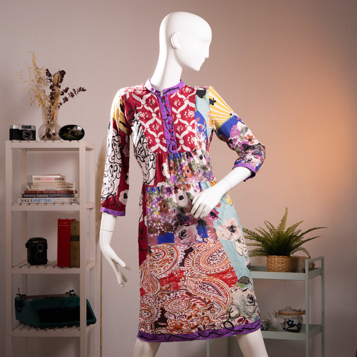 Museum Piece Archival Etro Milano S/S 2003 Silk Patchwork Midi Dress – pure silk, maximalist mixed-print patchwork combining crimson Moorish tile motif, abstract face line drawing, watercolour floral, yellow stripe, paisley and blue abstract panels, purple contrast trim at collar, cuffs and hem, hand-blown red glass buttons at placket, gathered empire waist, long sleeves, rare runway archive IT 42, flat lay editorial shot