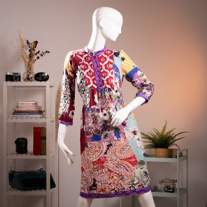 Museum Piece Archival Etro Milano S/S 2003 Silk Patchwork Midi Dress – pure silk, maximalist mixed-print patchwork combining crimson Moorish tile motif, abstract face line drawing, watercolour floral, yellow stripe, paisley and blue abstract panels, purple contrast trim at collar, cuffs and hem, hand-blown red glass buttons at placket, gathered empire waist, long sleeves, rare runway archive IT 42, flat lay editorial shot
