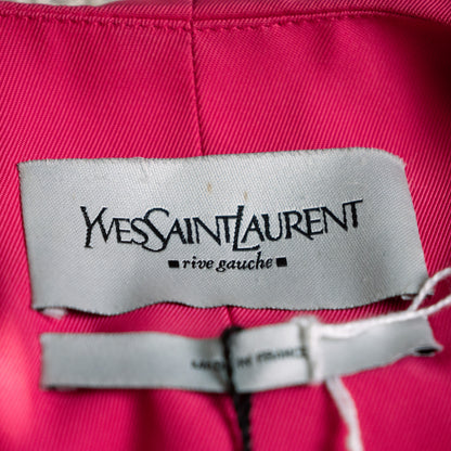 Close-up of the woven satin Yves Saint Laurent rive gauche main brand label inside the collar showing the historic typography.