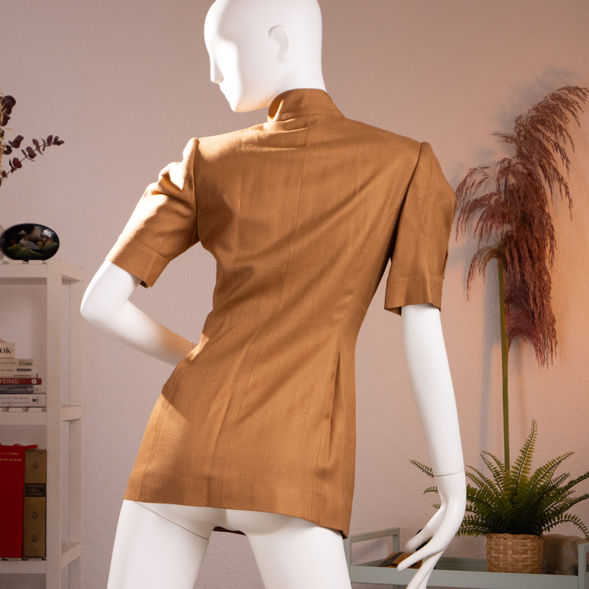 Rear view of the archival Scherrer Couture double-breasted long vest highlighting the structured hourglass silhouette and shoulder padding.