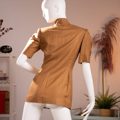 Rear view of the archival Scherrer Couture double-breasted long vest highlighting the structured hourglass silhouette and shoulder padding.