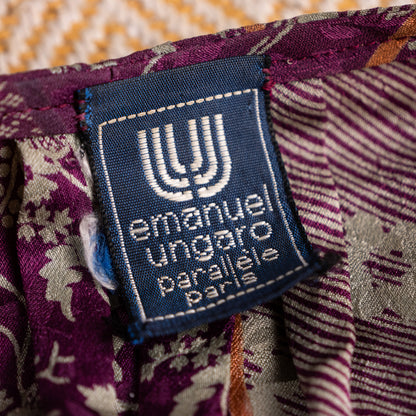Close-up interior view of the pristine woven navy-blue Emanuel Ungaro Parallèle Paris neck label featuring the signature white double-U logo.