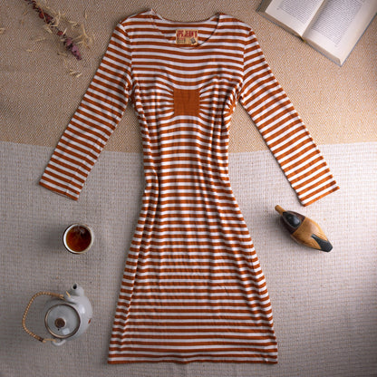 Jean Paul Gaultier JPG Jean's Archival 90s Marinière Stripe Midi Dress – rust orange and white horizontal stripe stretch jersey, optical illusion trompe l'oeil ruched bust effect, single chest patch pocket, scoop neckline, long sleeves, body-con midi silhouette, JPG Jean's Collection 0007 woven label, flat lay editorial shot