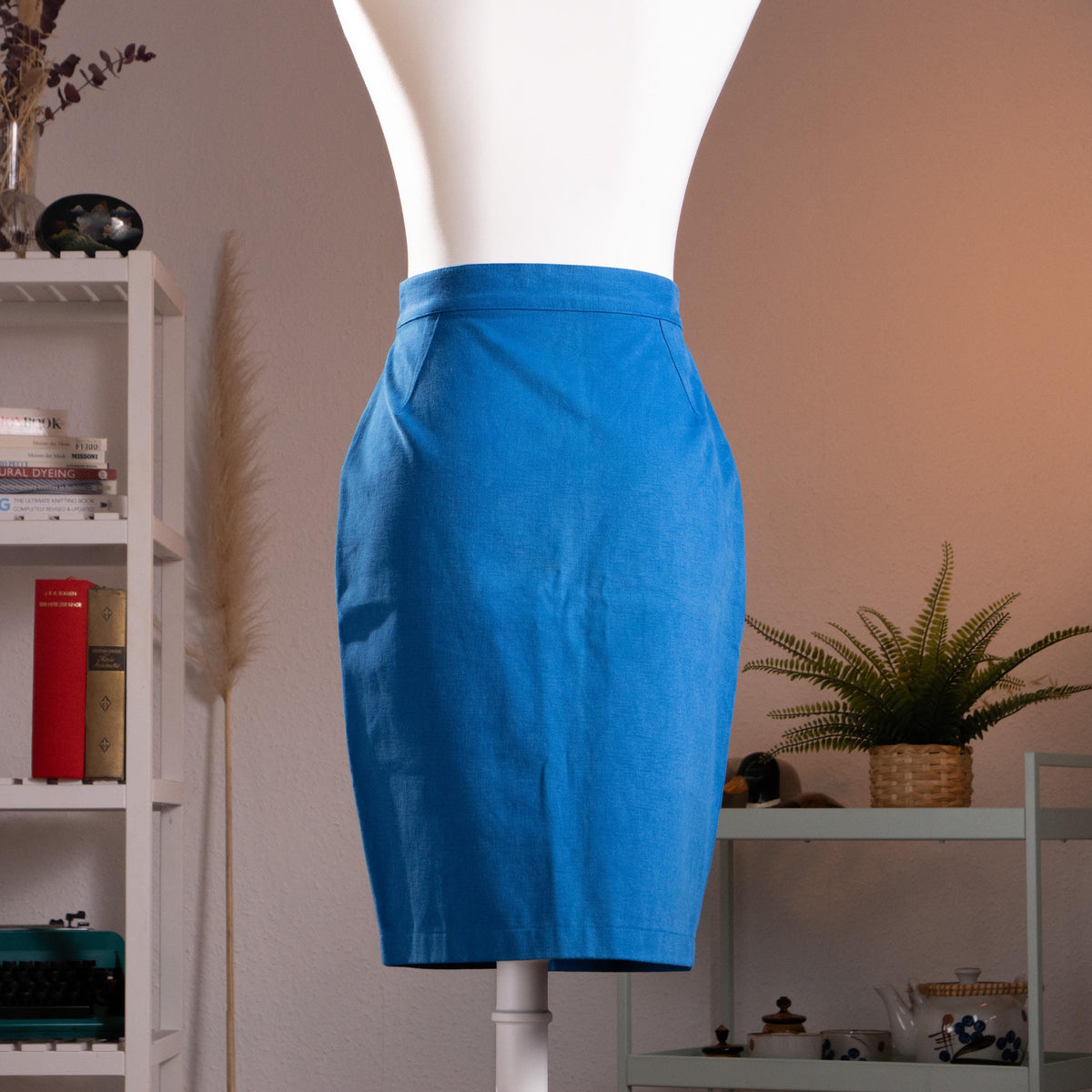 back view Archival Thierry Mugler Activ NOS 90s Cobalt Blue Cotton Pencil Skirt – saturated cobalt blue crisp cotton, extreme high waist with single silver snap button, front centre seam with small kick vent at hem, wasp waist sculptural silhouette, NOS deadstock, TIME Srl Italy, product shot on dress form