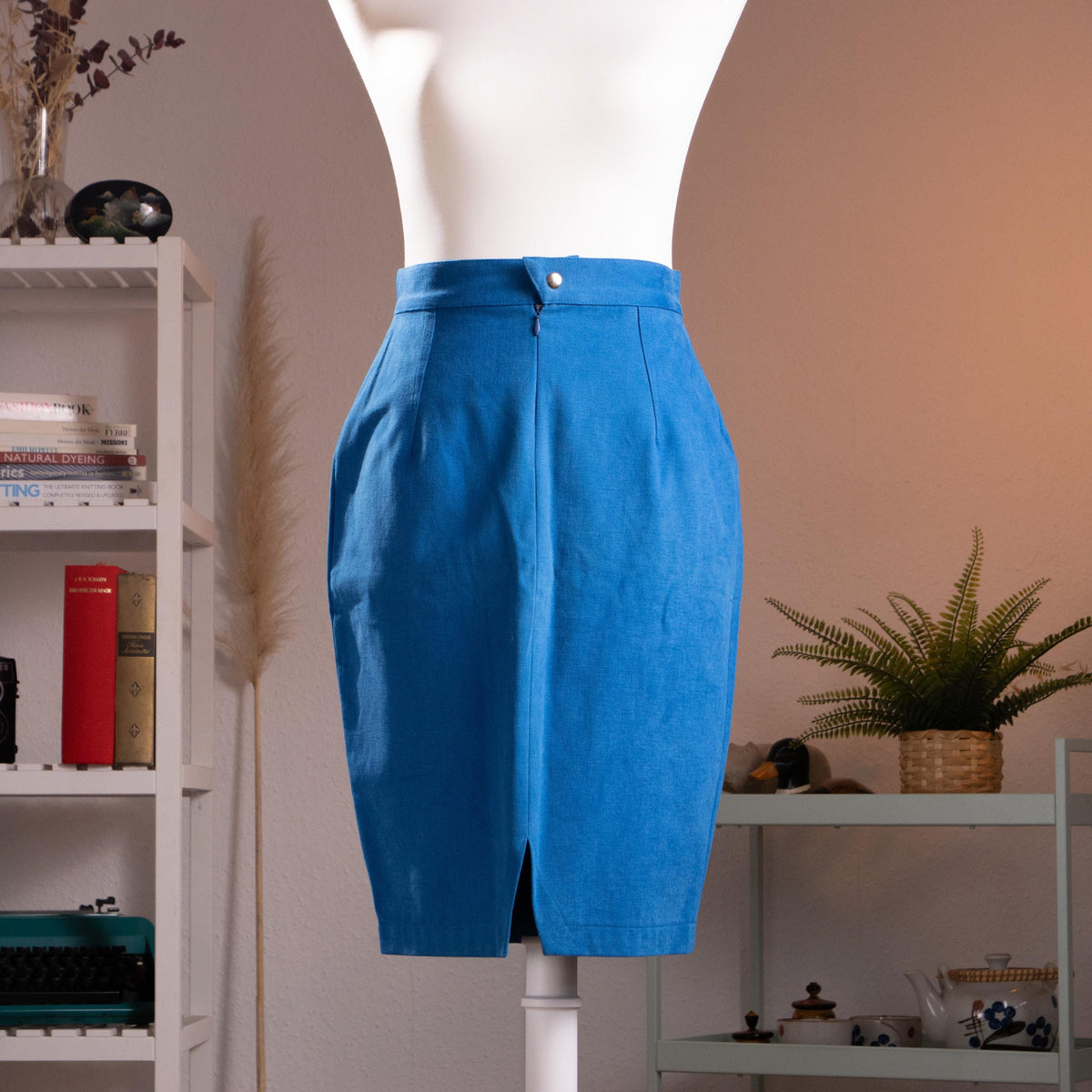 Archival Thierry Mugler Activ NOS 90s Cobalt Blue Cotton Pencil Skirt – saturated cobalt blue crisp cotton, extreme high waist with single silver snap button, front centre seam with small kick vent at hem, wasp waist sculptural silhouette, NOS deadstock, TIME Srl Italy, product shot on dress form